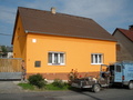 Zateplená stěna z ulice